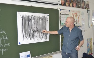 Belgijski ilustrator Jan De Kinder na Osnovni šoli Idrija